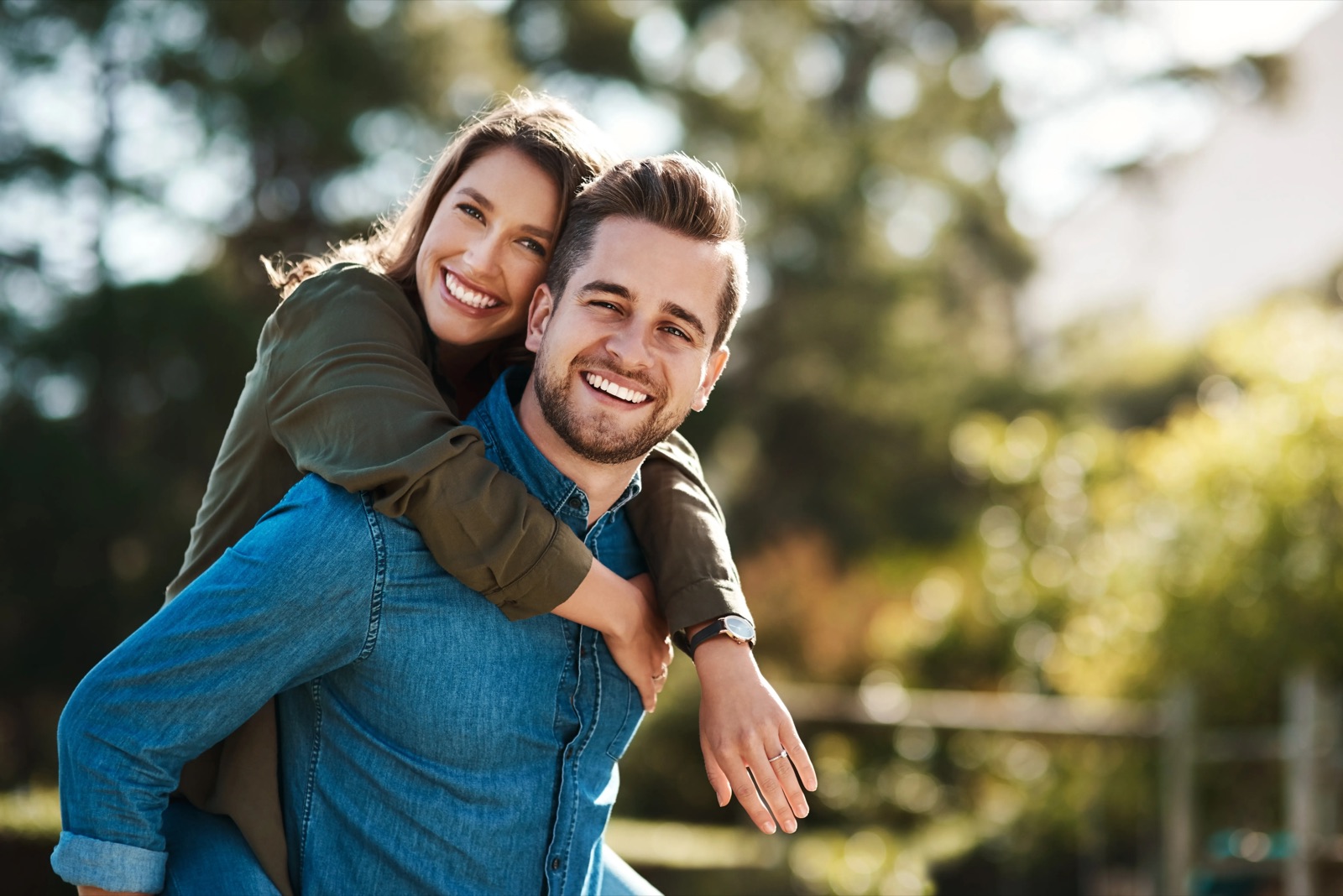 Couple smiling together outdoors